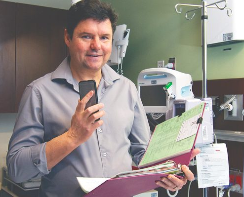 Saskatchewan physicians such as Dr. Mark Brown (pictured here) can now use new technologies to generate care reports on their patients and quickly add those reports to the provincial Electronic Health Record Viewer (eHR Viewer).