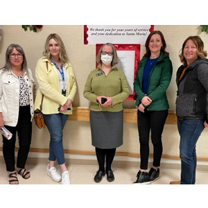 EBP team members are pictured here with Kelly Chessie (centre), executive director of Santa Maria Senior Citizens Home in Regina.